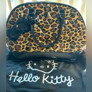 Hello kitty animal print handbag, like new! With dust bag